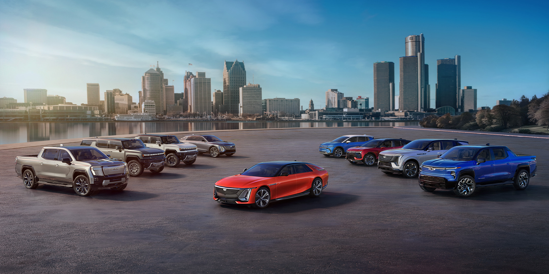 GM Electric Vehicle Lineup Parked Together With City Skyline In Background